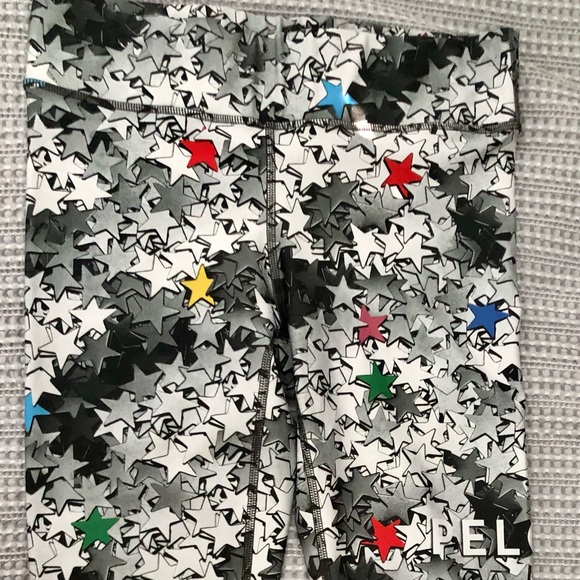 SOLD - Peloton Terez star Capris 🦄 - Picture 1 of 5